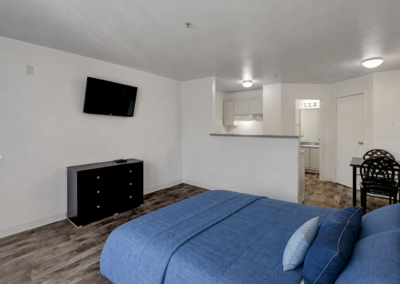 Kensington Suites | Short-Term Rentals Long-Term Living in Las Vegas | Living and Sleeping Area