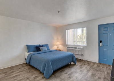 Kensington Suites | Short-Term Rentals Long-Term Living in Las Vegas | Living and Sleeping Area